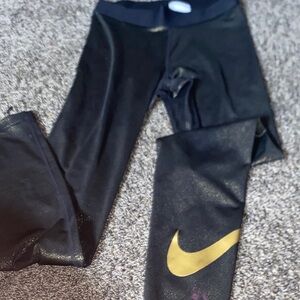 Nike Kids Black Leggings with Gold Logo